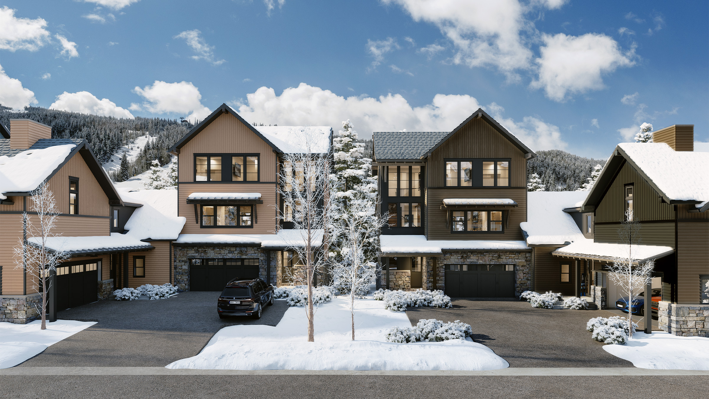 Residences feature modern mountain architecture, two-car garages, and private driveways.